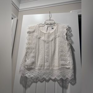 Crochet trim sleeveless lace top